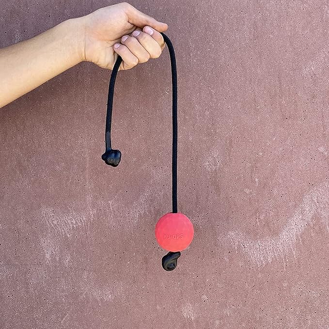 K9 Ops Dog Ball on a Rope Moki Tug Toy - Solid Rubber Fetch Training Reward - Large Dogs Tugs Durable Aggressive Chewers (Ruby Red, LG/XL)